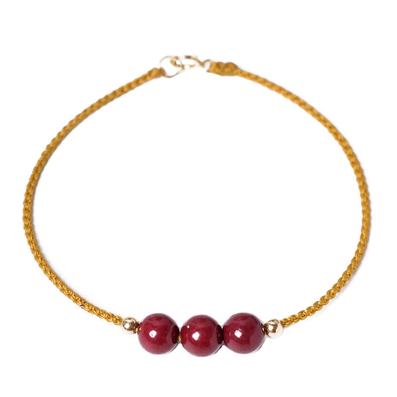 Bracciale intrecciato con corda di benedizione in cinabro naturale placcato oro 14K Buddha Stones