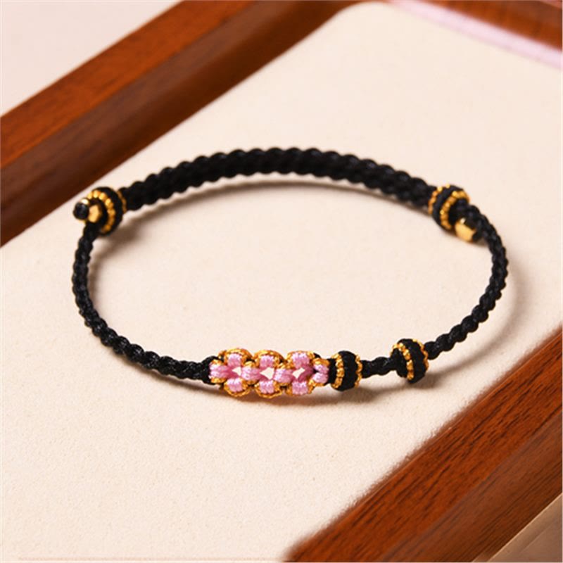 Braccialetto di corda intrecciata con protezione in fiore di pesco fatto a mano Buddha Stones