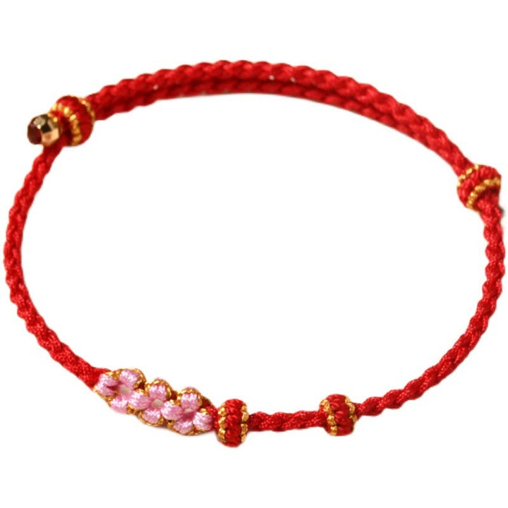 Braccialetto di corda intrecciata con protezione in fiore di pesco fatto a mano Buddha Stones