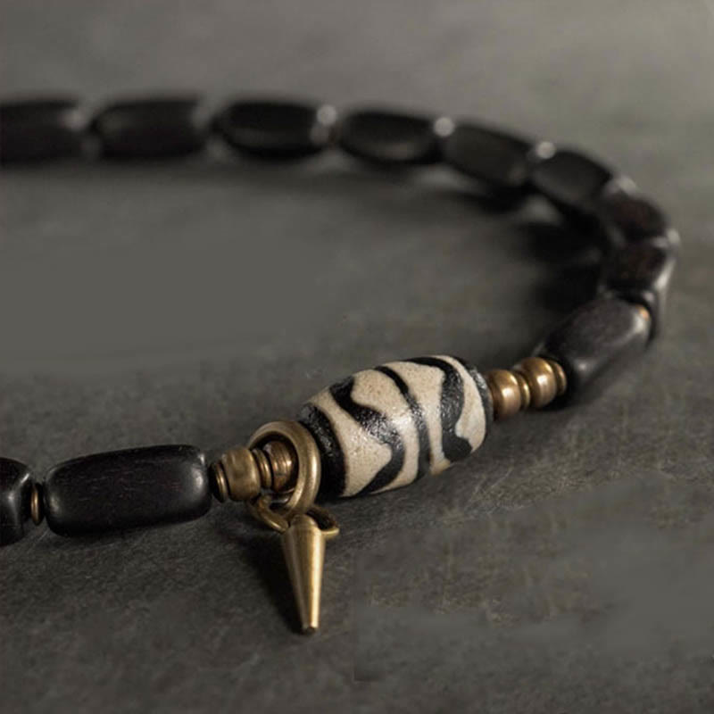 Braccialetto doppio giro in rame con perline di legno di Buddha Stones del Tibet Dzi