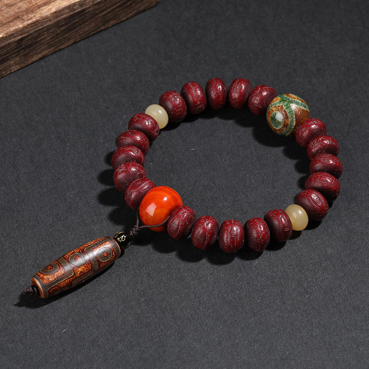Buddha Stones Tibet Bodhi Seed Dzi Bead Braccialetto della fortuna del leone danzante Mala del polso