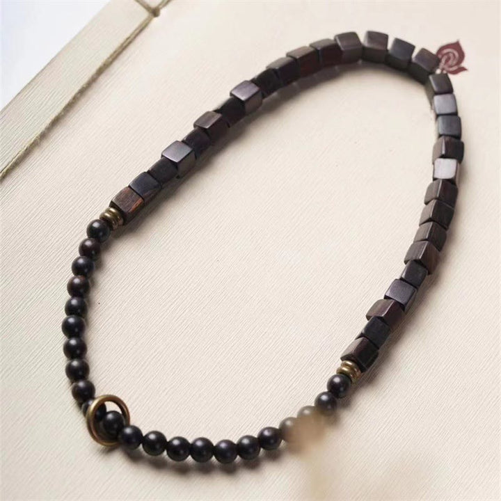 Braccialetto doppio giro in perle quadrate in legno di ebano tibetano Buddha Stones Peace