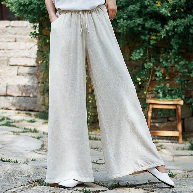 Pantaloni da yoga da donna con tasche e gamba larga, modello Buddha Stones, tinta unita - image 1