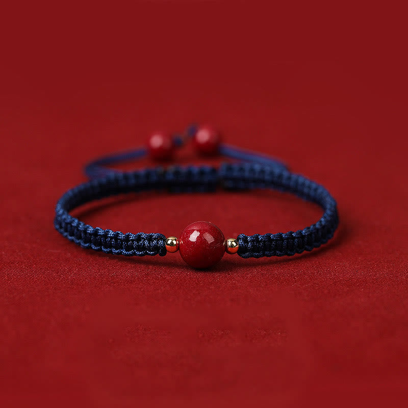 Braccialetto con cordino rosso e perline di cinabro fortunato Buddha Stones