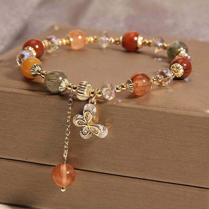 Braccialetto con ciondolo a farfalla con cristallo arcobaleno naturale Fu Lu Shou Buddha Stones Rutilato