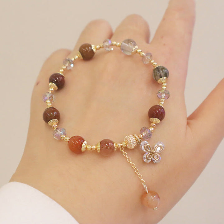 Braccialetto con ciondolo a farfalla con cristallo arcobaleno naturale Fu Lu Shou Buddha Stones Rutilato
