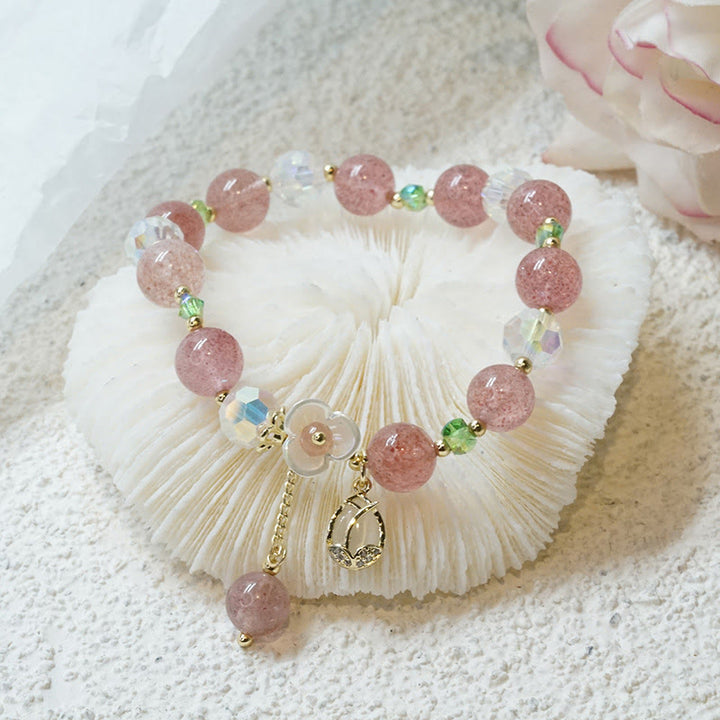Braccialetto di guarigione con fiori di fluorite, quarzo fragola, quarzo rutilato Buddha Stones