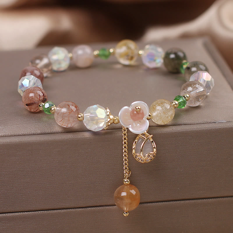 Braccialetto di guarigione con fiori di fluorite, quarzo fragola, quarzo rutilato Buddha Stones