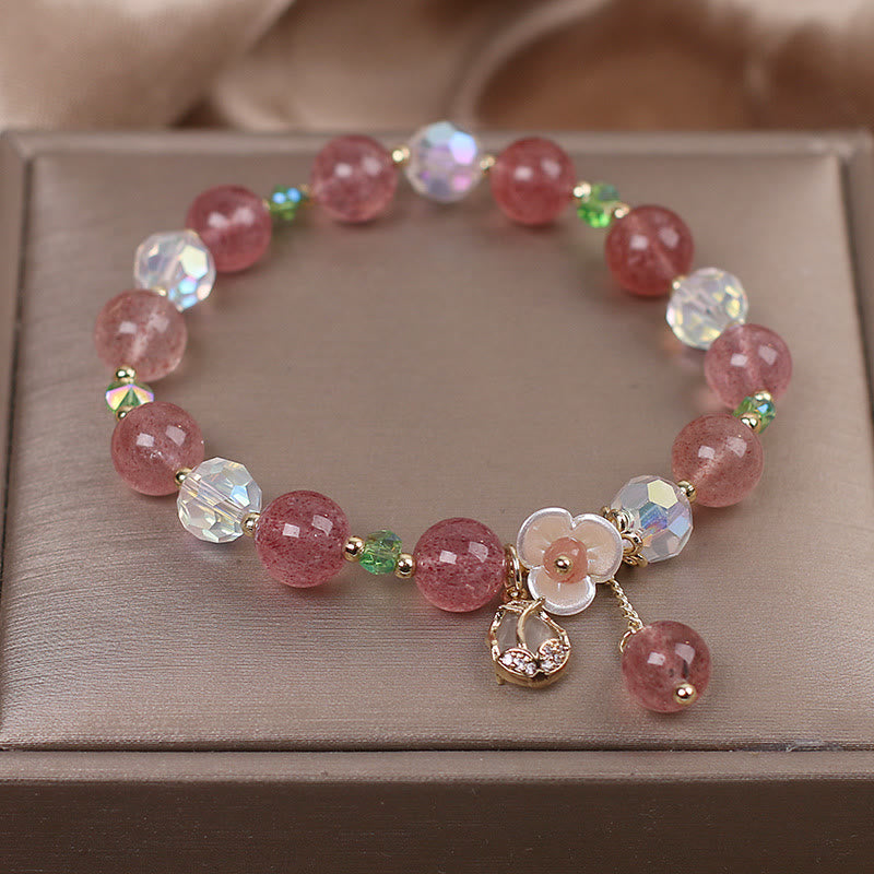 Braccialetto di guarigione con fiori di fluorite, quarzo fragola, quarzo rutilato Buddha Stones