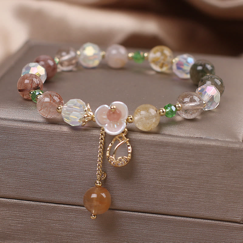 Braccialetto di guarigione con fiori di fluorite, quarzo fragola, quarzo rutilato Buddha Stones