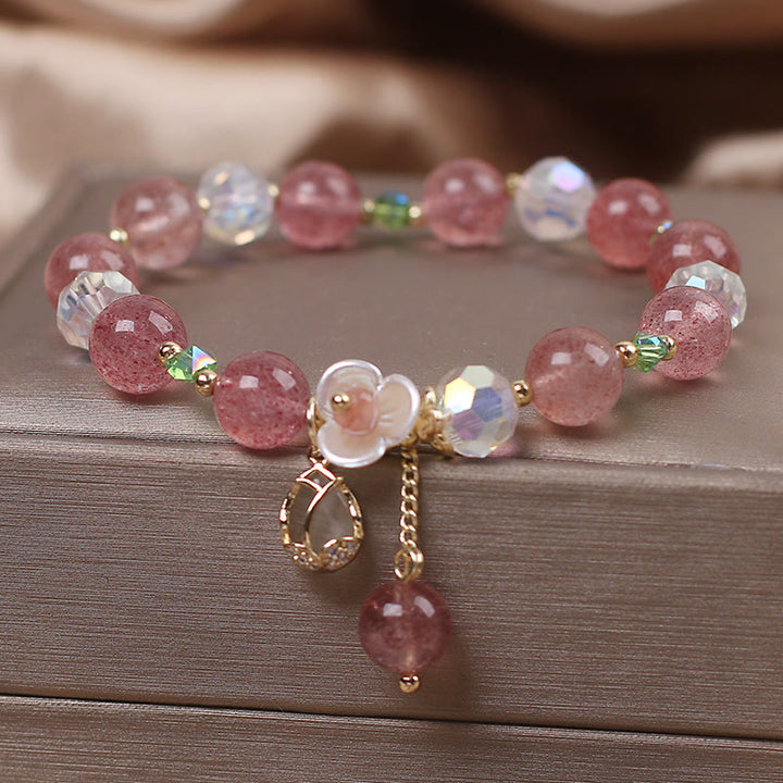 Braccialetto di guarigione con fiori di fluorite, quarzo fragola, quarzo rutilato Buddha Stones