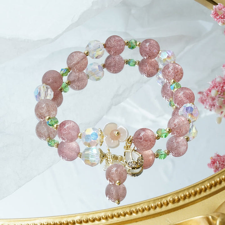 Braccialetto di guarigione con fiori di fluorite, quarzo fragola, quarzo rutilato Buddha Stones