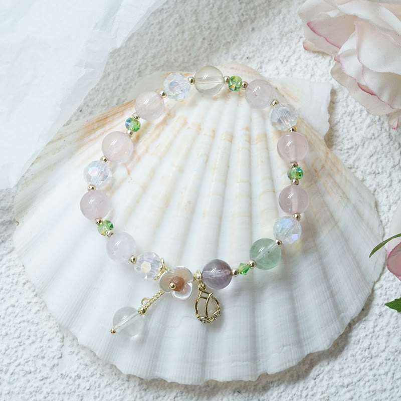Braccialetto di guarigione con fiori di fluorite, quarzo fragola, quarzo rutilato Buddha Stones