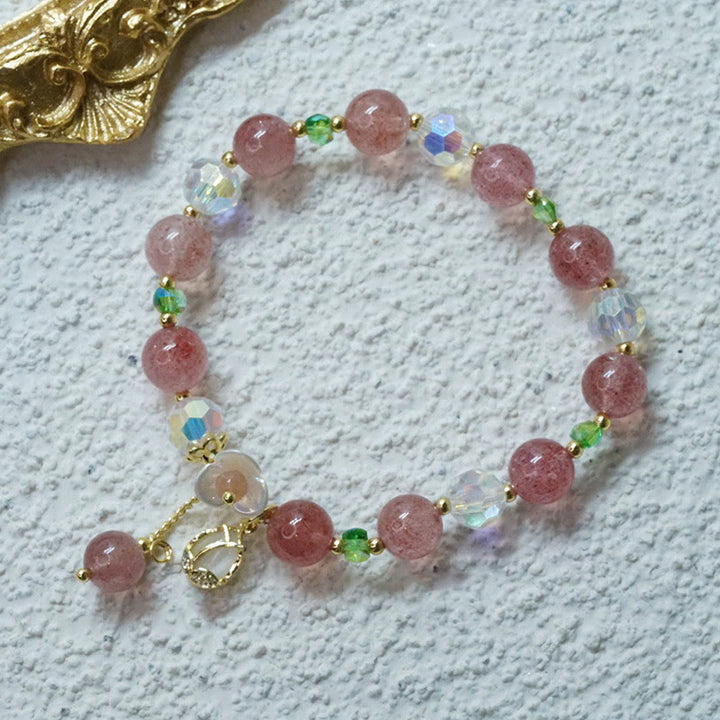 Braccialetto di guarigione con fiori di fluorite, quarzo fragola, quarzo rutilato Buddha Stones