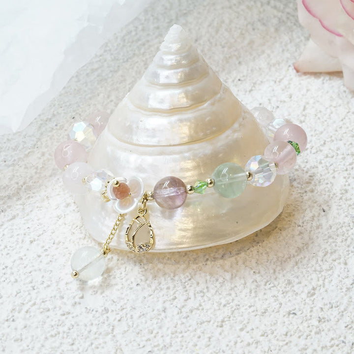 Braccialetto di guarigione con fiori di fluorite, quarzo fragola, quarzo rutilato Buddha Stones