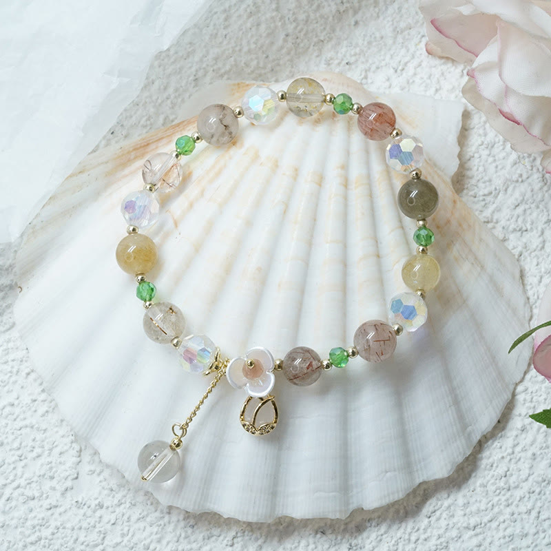Braccialetto di guarigione con fiori di fluorite, quarzo fragola, quarzo rutilato Buddha Stones