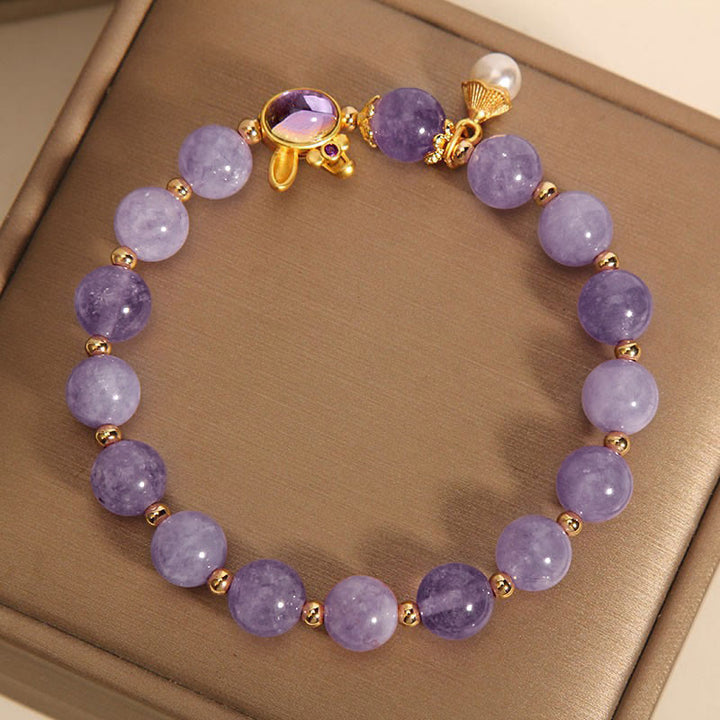 Braccialetto della felicità con coniglio in giada viola naturale Buddha Stones
