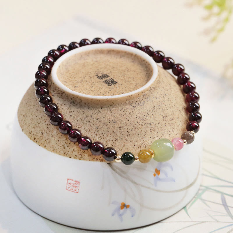 Braccialetto della passione con perline di giada e tormalina naturale di granato e Buddha Stones