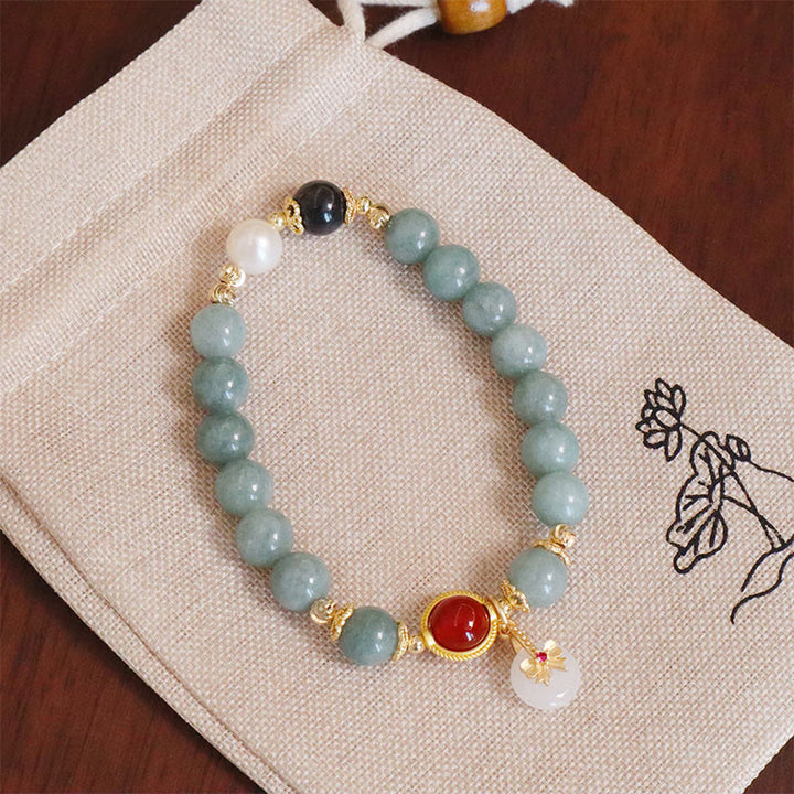 Braccialetto della fortuna con papillon in perle di agata rossa e giada naturale Buddha Stones