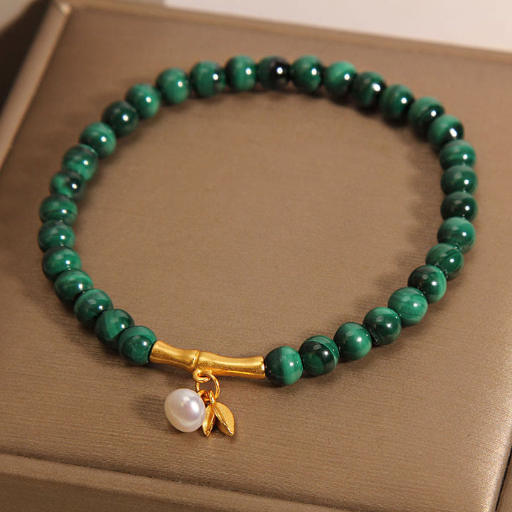 Bracciale anti-ansia in bambù portafortuna con perle di malachite naturale Buddha Stones - image 2