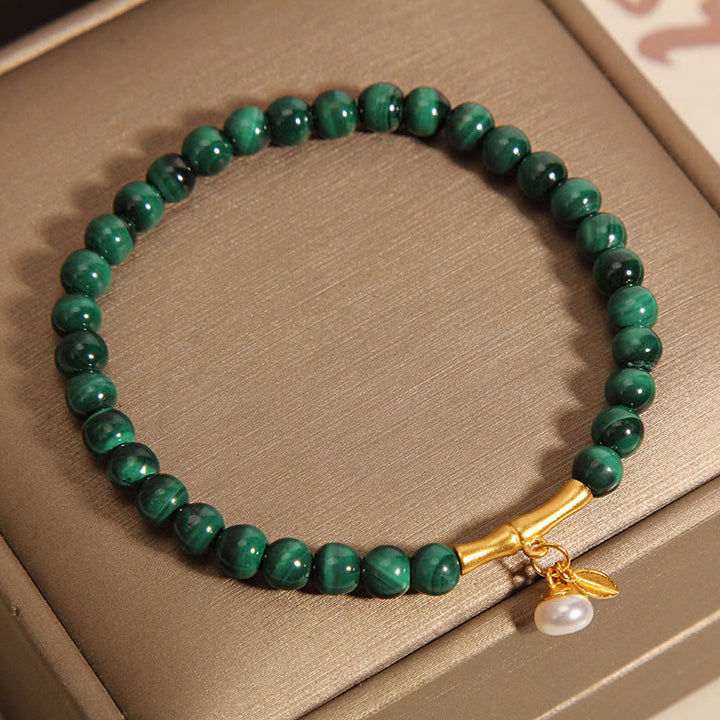 Bracciale anti-ansia in bambù portafortuna con perle di malachite naturale Buddha Stones - image 4