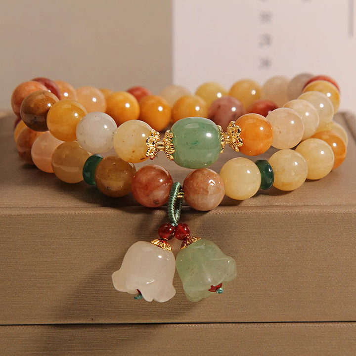 Braccialetto portafortuna a doppio strato con campanella e orchidea in seta dorata naturale del Tibet, Buddha Stones