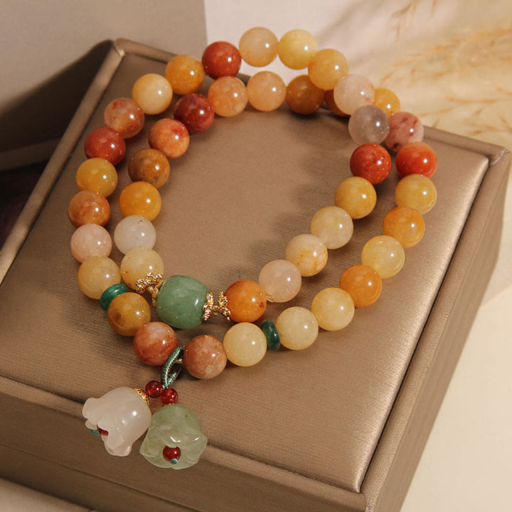Braccialetto portafortuna a doppio strato con campanella e orchidea in seta dorata naturale del Tibet, Buddha Stones