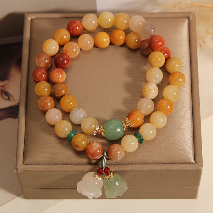 Braccialetto portafortuna a doppio strato con campanella e orchidea in seta dorata naturale del Tibet, Buddha Stones