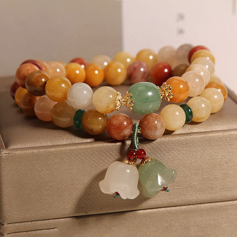 Braccialetto portafortuna a doppio strato con campanella e orchidea in seta dorata naturale del Tibet, Buddha Stones