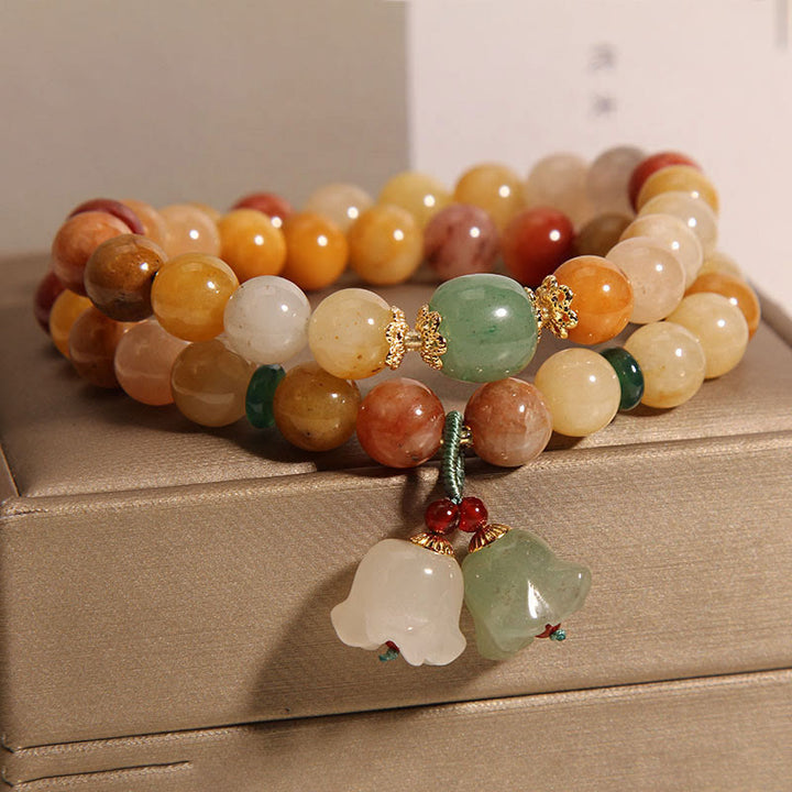 Braccialetto portafortuna a doppio strato con campanella e orchidea in seta dorata naturale del Tibet, Buddha Stones