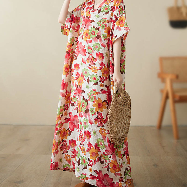 Abito midi in cotone con maniche a mezza manica e tasche, con fiori rossi, blu e verdi , Buddha Stones