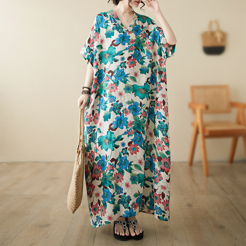 Abito midi in cotone con maniche a mezza manica e tasche, con fiori rossi, blu e verdi , Buddha Stones
