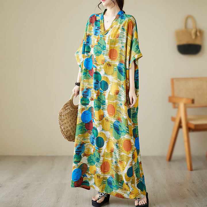 Abito midi in cotone con maniche a mezza manica e tasche, con pois colorati blu e arancioni, Buddha Stones - image 2