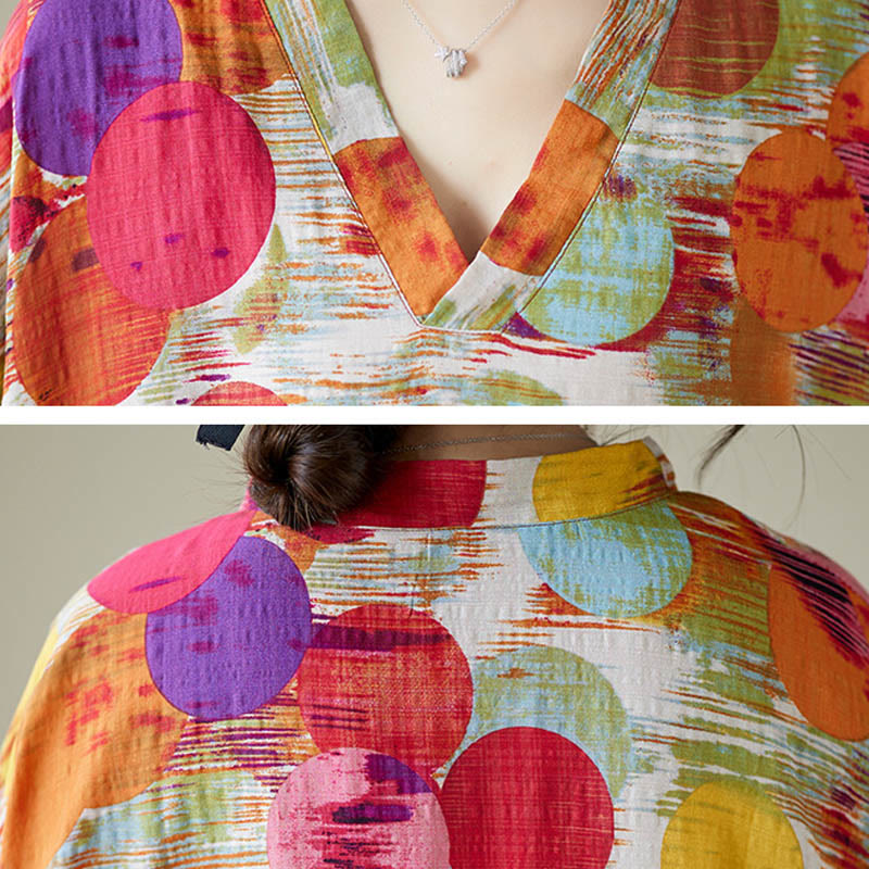 Abito midi in cotone con maniche a mezza manica e tasche, con pois colorati blu e arancioni, Buddha Stones