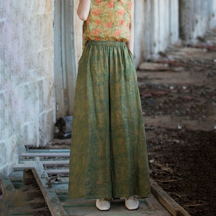Pantaloni larghi con tasche e cintura flessibile in lino ramiè verde giallo Buddha Stones