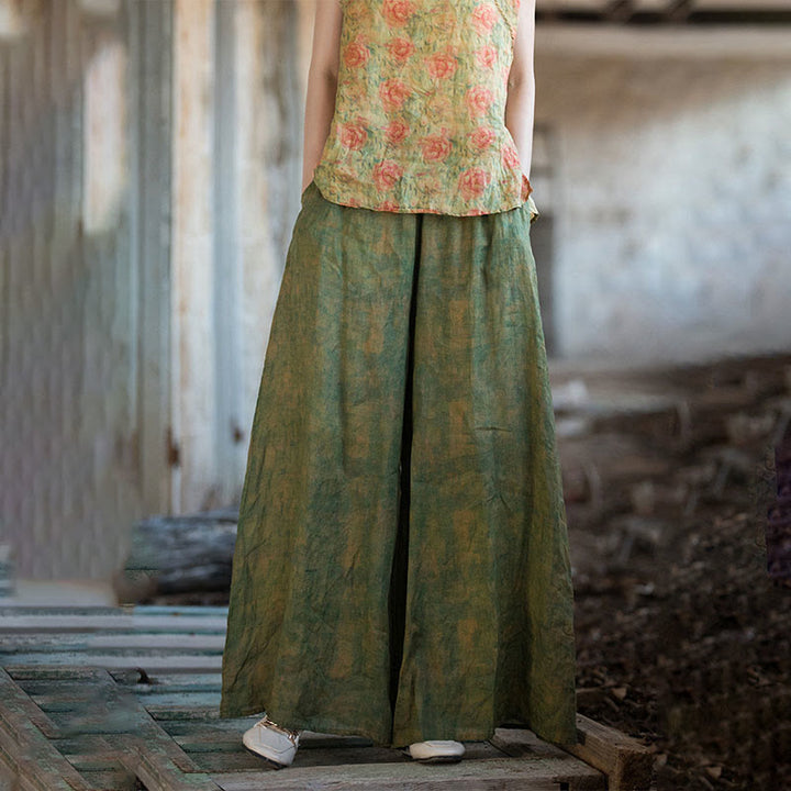 Pantaloni larghi con tasche e cintura flessibile in lino ramiè verde giallo Buddha Stones
