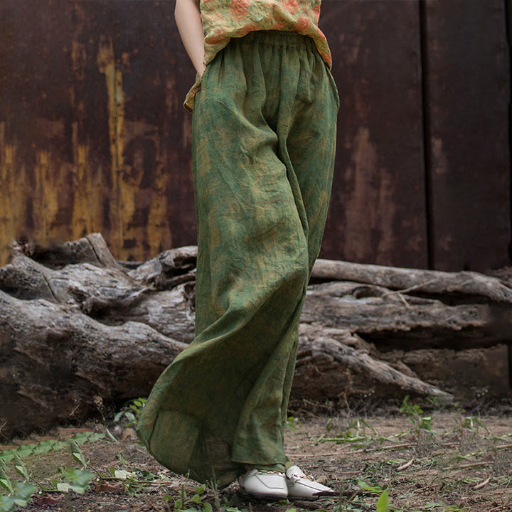 Pantaloni larghi con tasche e cintura flessibile in lino ramiè verde giallo Buddha Stones