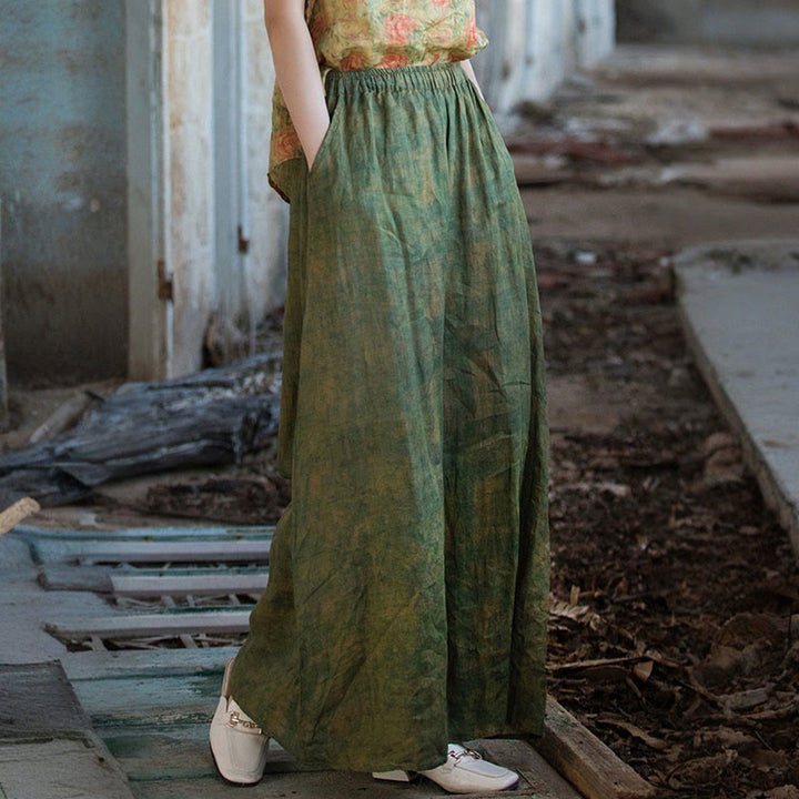 Pantaloni larghi con tasche e cintura flessibile in lino ramiè verde giallo Buddha Stones