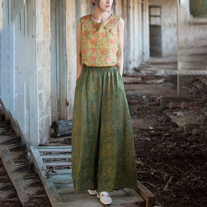 Pantaloni larghi con tasche e cintura flessibile in lino ramiè verde giallo Buddha Stones