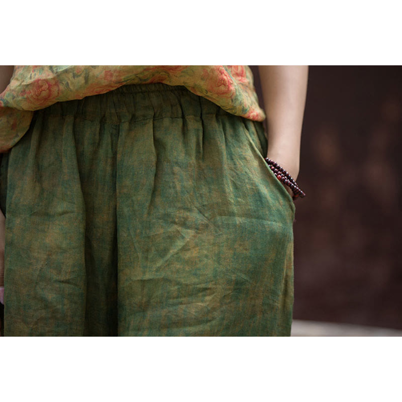 Pantaloni larghi con tasche e cintura flessibile in lino ramiè verde giallo Buddha Stones