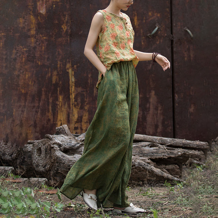 Pantaloni larghi con tasche e cintura flessibile in lino ramiè verde giallo Buddha Stones