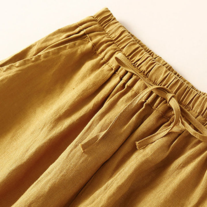 Pantaloni harem larghi con coulisse e tasche, tinta unita, con motivo floreale Buddha Stones. - image 29