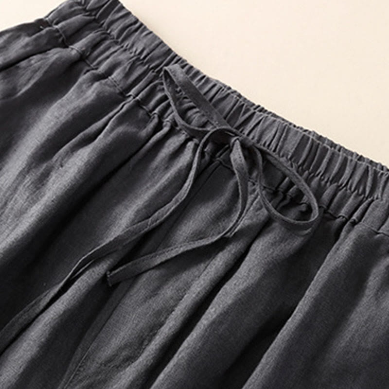Pantaloni harem larghi con coulisse e tasche, tinta unita, con motivo floreale Buddha Stones. - image 15