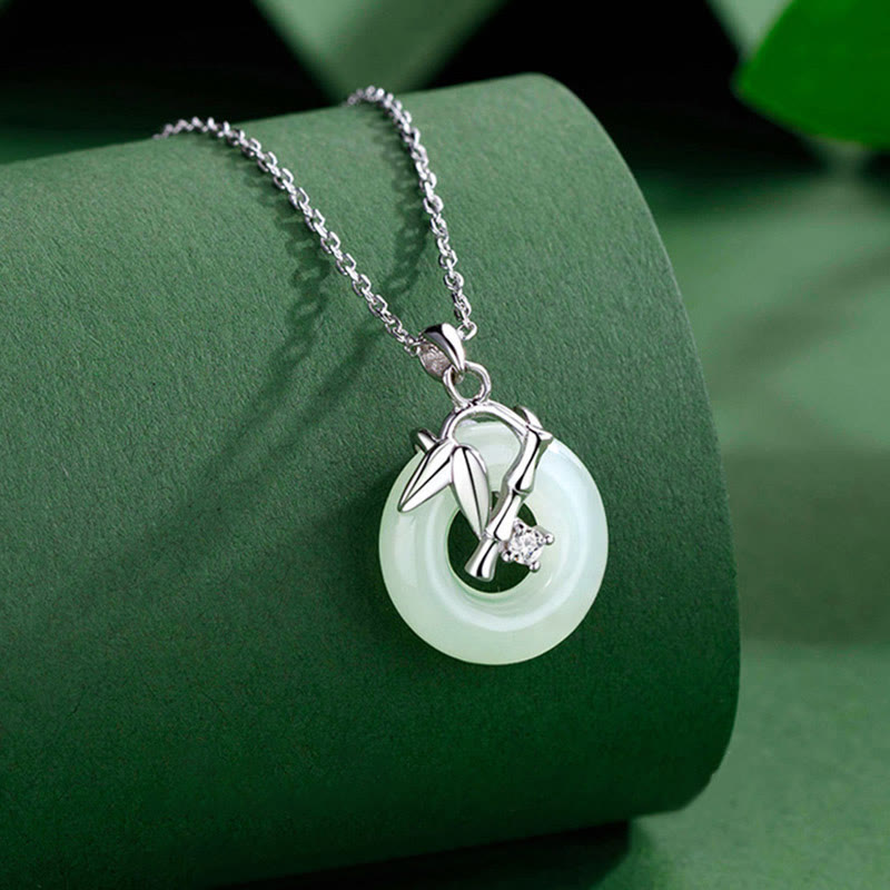 Collana con ciondolo Buddha Stones in argento sterling 925, giada Hetian, foglia di bambù, fibbia della pace e prosperità