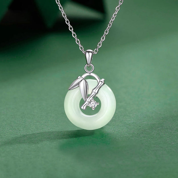 Collana con ciondolo Buddha Stones in argento sterling 925, giada Hetian, foglia di bambù, fibbia della pace e prosperità