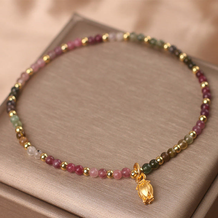 Braccialetto positivo con fiori di tormalina colorata Buddha Stones