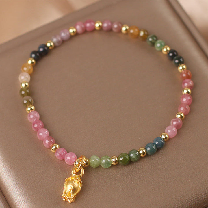 Braccialetto positivo con fiori di tormalina colorata Buddha Stones