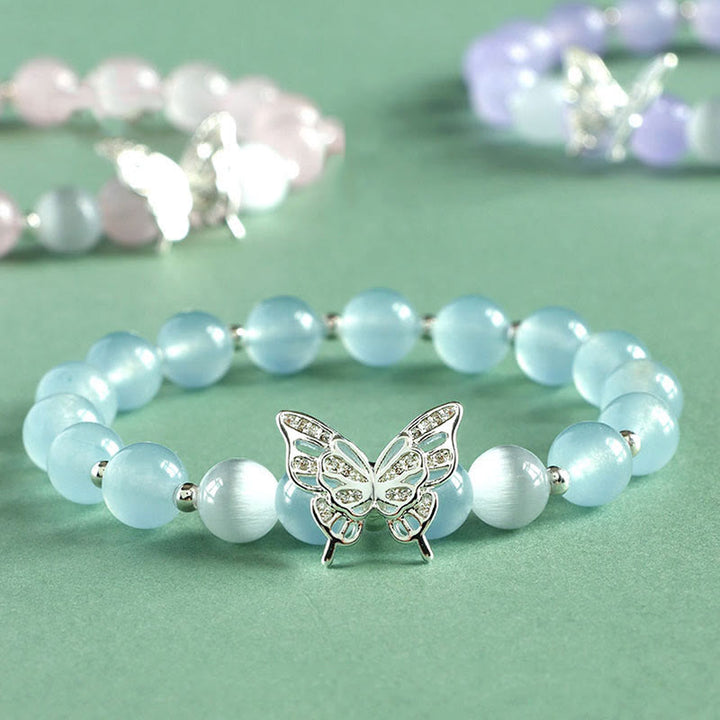 Braccialetto energetico a farfalla in calcedonio blu, cristallo rosa e calcedonio viola Buddha Stones
