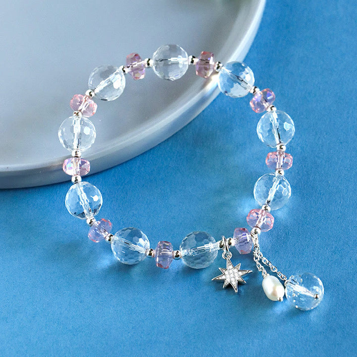 Braccialetto con ciondolo a forma di stella con protezione in cristallo rosa e pietre Buddha Stones - image 1