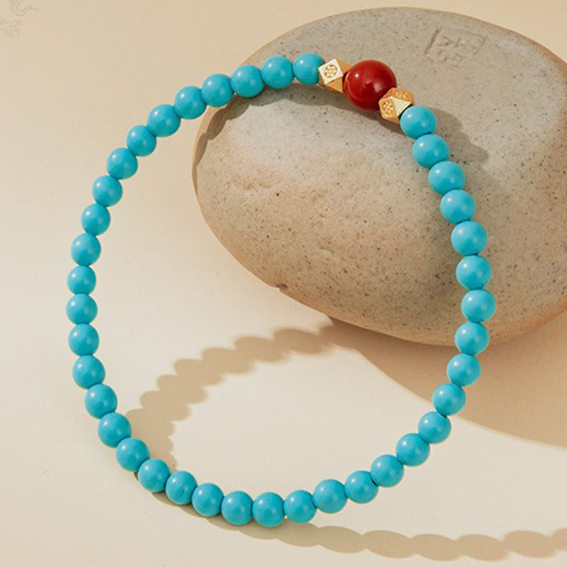 Braccialetto di protezione con perline di agata rossa e turchese Buddha Stones